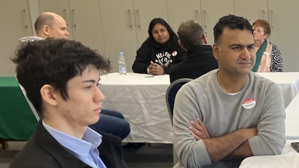 a group of people sitting at a table