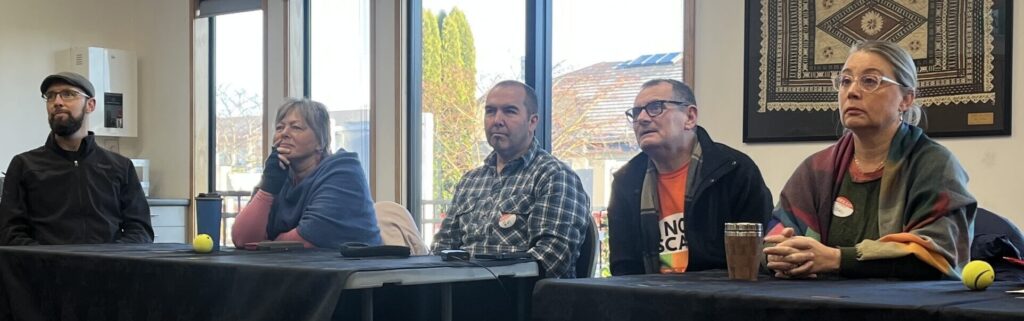 a group of people sitting at a table