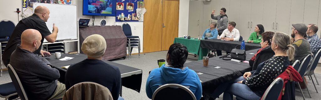 Someone leaving the room at Talk Business