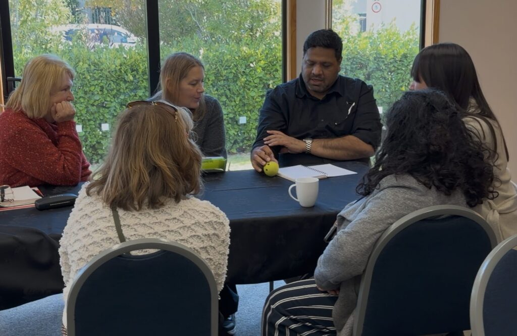 Groups discussion around a table